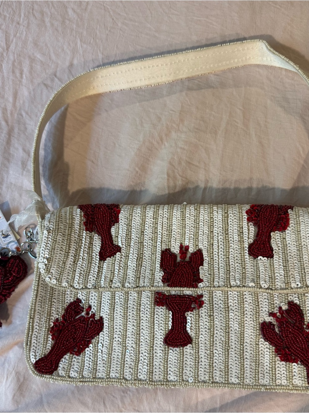 Ivory Sequin Shoulder Bag with Red Bead Embellishments Viral lobster purse